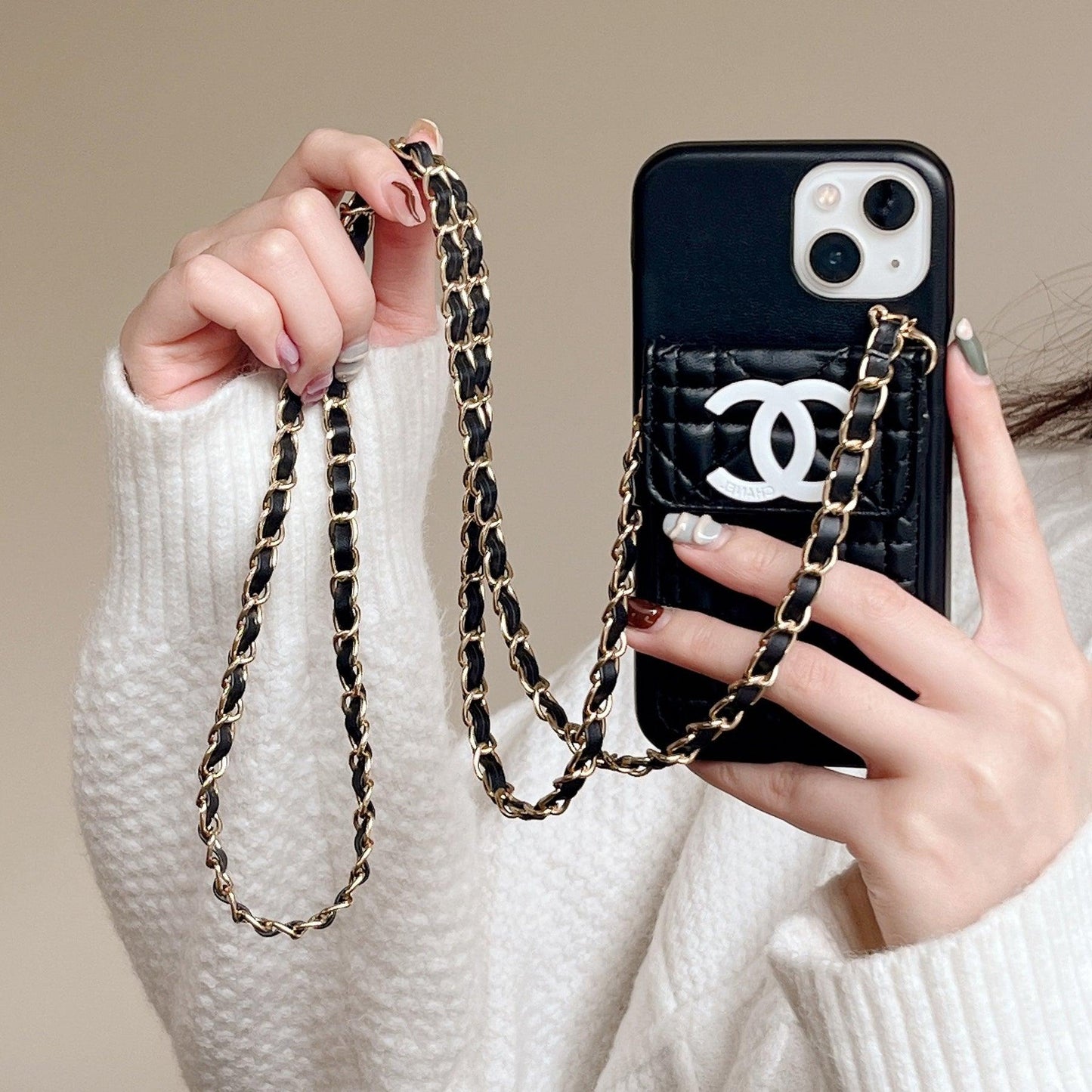 CC iPhone case on chain